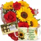 MB01-Mini buquê 4 Rosas vermelhas e 4 Girassóis+Chocolate 8un+Caneca(Girassol)"Você é um presente de Deus...